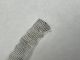 Tinned Copper Flat Flexible Braid Woven With Cloth, 1/2 inch Wide, Consists Of 10 Individually Stranded Copper Conductors Winding Down The Woven Ribbon. Acts As a Single Conductor. Very Flat
